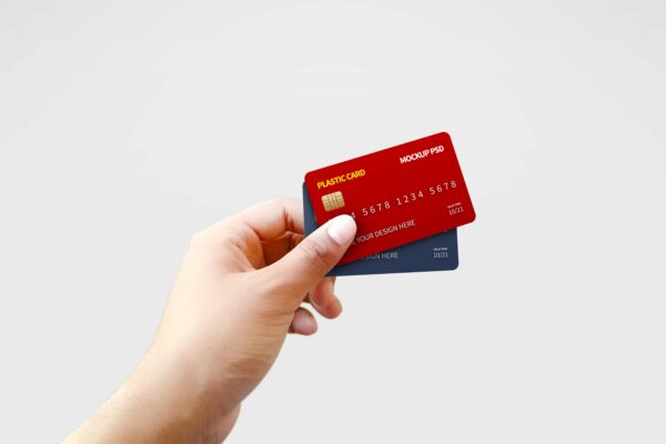 逼真手持银行信用卡塑料卡片设计展示样机模版 Chipped Plastic Card in Hand Mockup